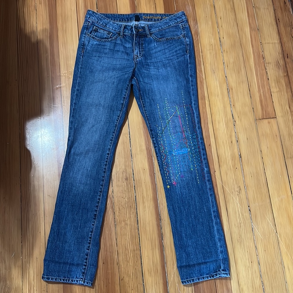 Women’s Gap premium straight jeans with patched knee and decorative embroidery